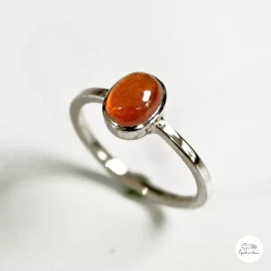 anello in oro bianco con granato arancione 00