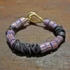 bracciale trade beads con dischi in titanio anodizzato 01