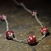 Collana trade beads con vaghi provenienti dal Mali e raccordi in maglia romana d'argento 00